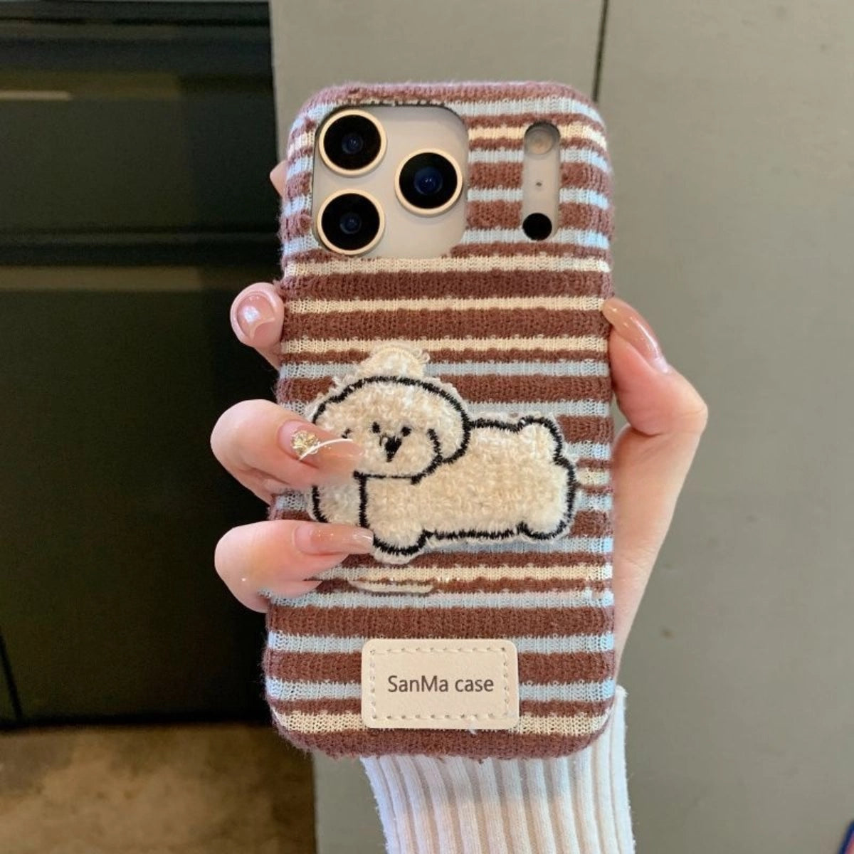 Terry Puppy embroidered phone case by TRLab Shop featuring a cute puppy design on a protective accessory for smartphones.
