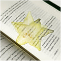 Translucent fruit-shaped acrylic bookmark with colorful fruit illustrations, ideal for marking pages in books.