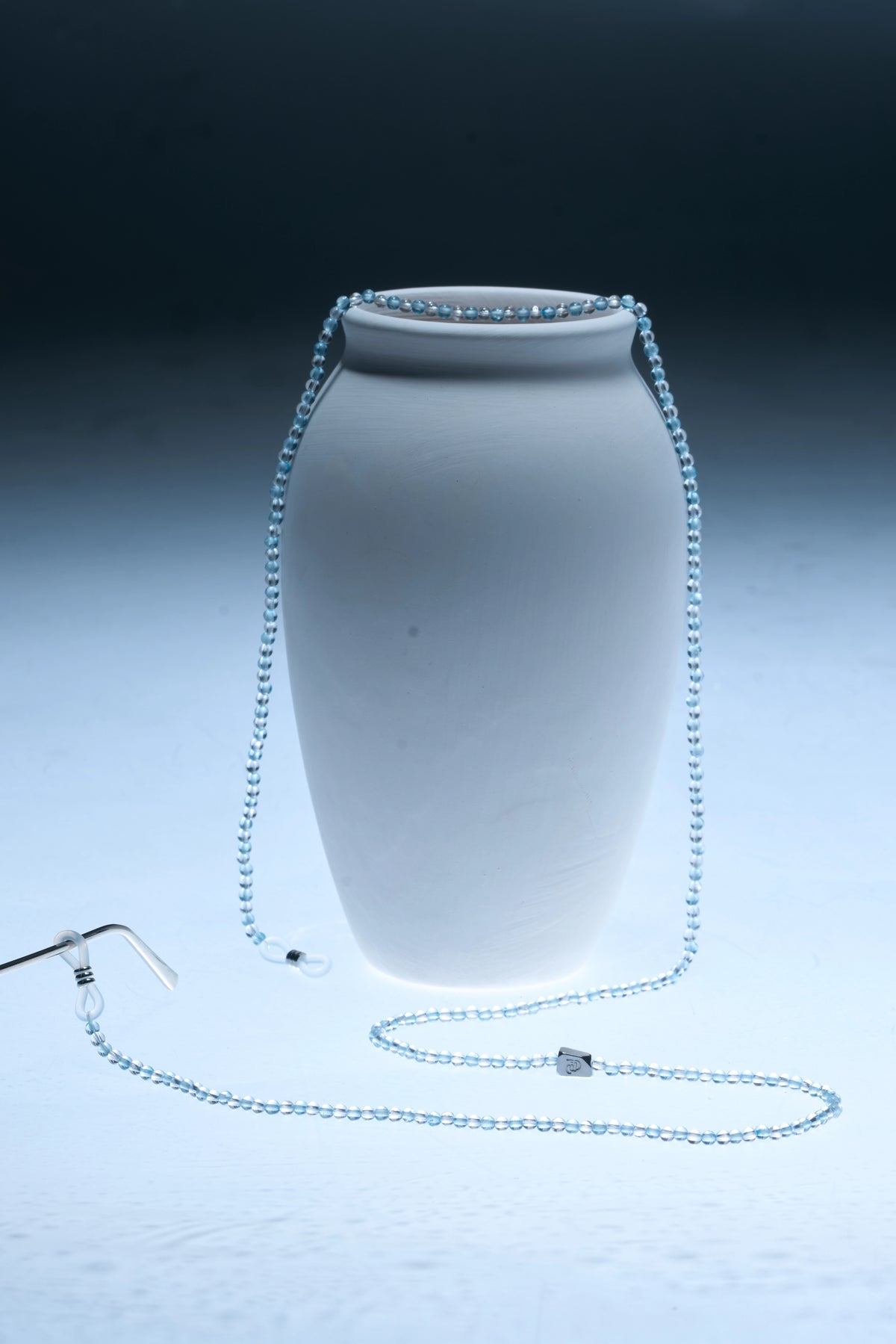 Aquamarine and clear quartz eyeglass chain with gold-tone accents by ROCKBUND, featuring polished stones connected by delicate links.