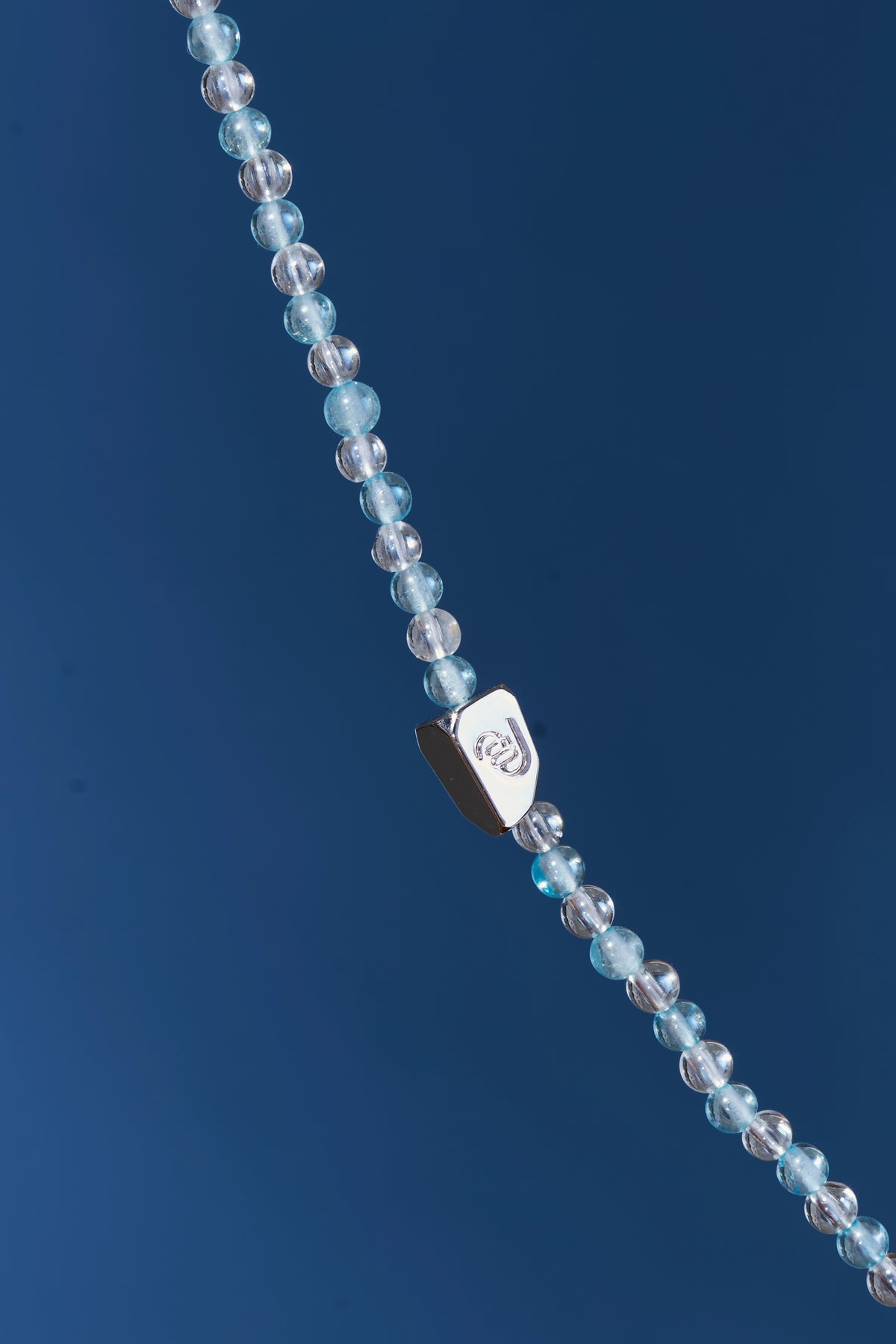 Aquamarine and clear quartz eyeglass chain with silver-tone clasps, stylish and functional accessory by ROCKBUND.