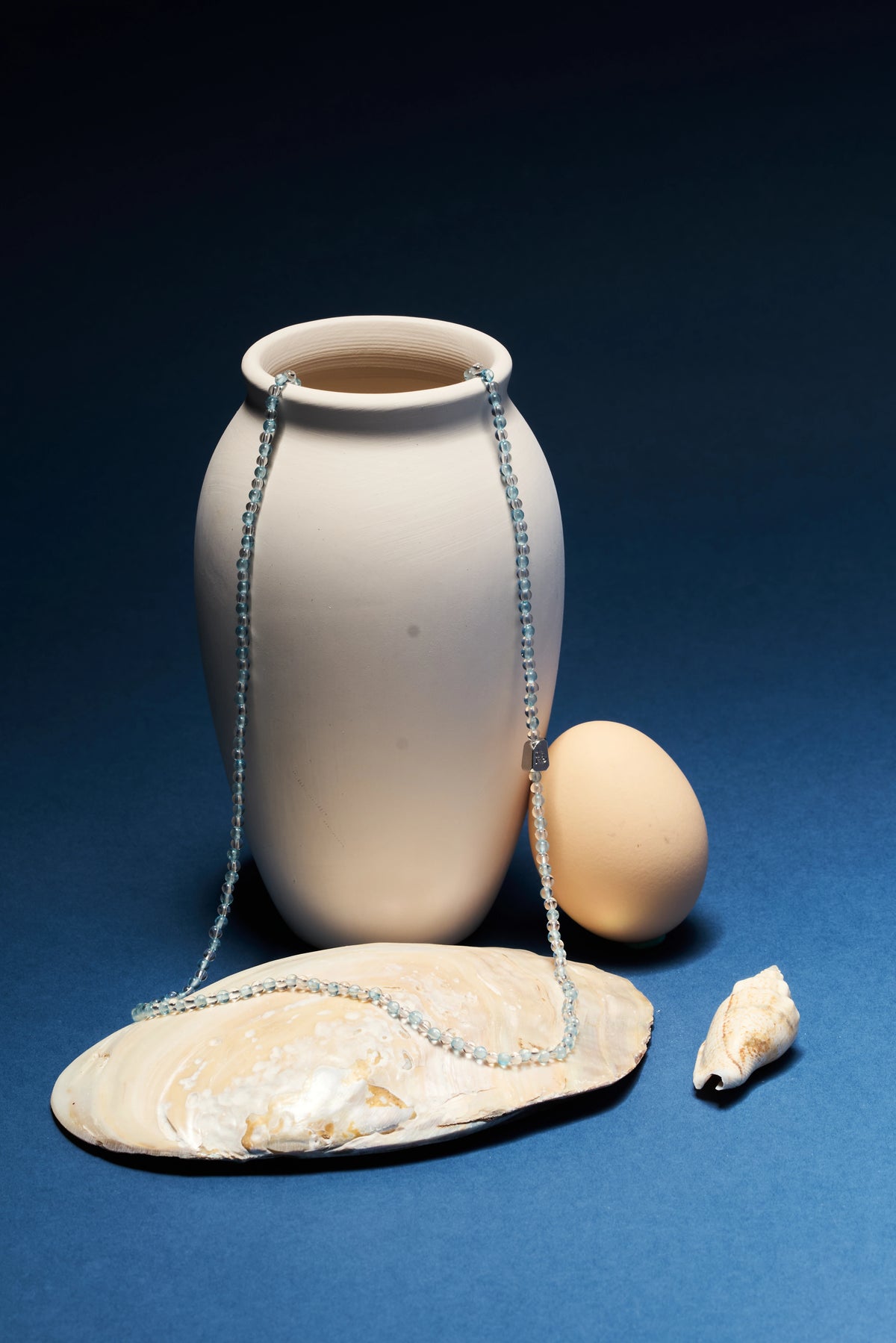 Aquamarine and clear quartz eyeglass chain with gold-tone accents, stylish and functional accessory by ROCKBUND.