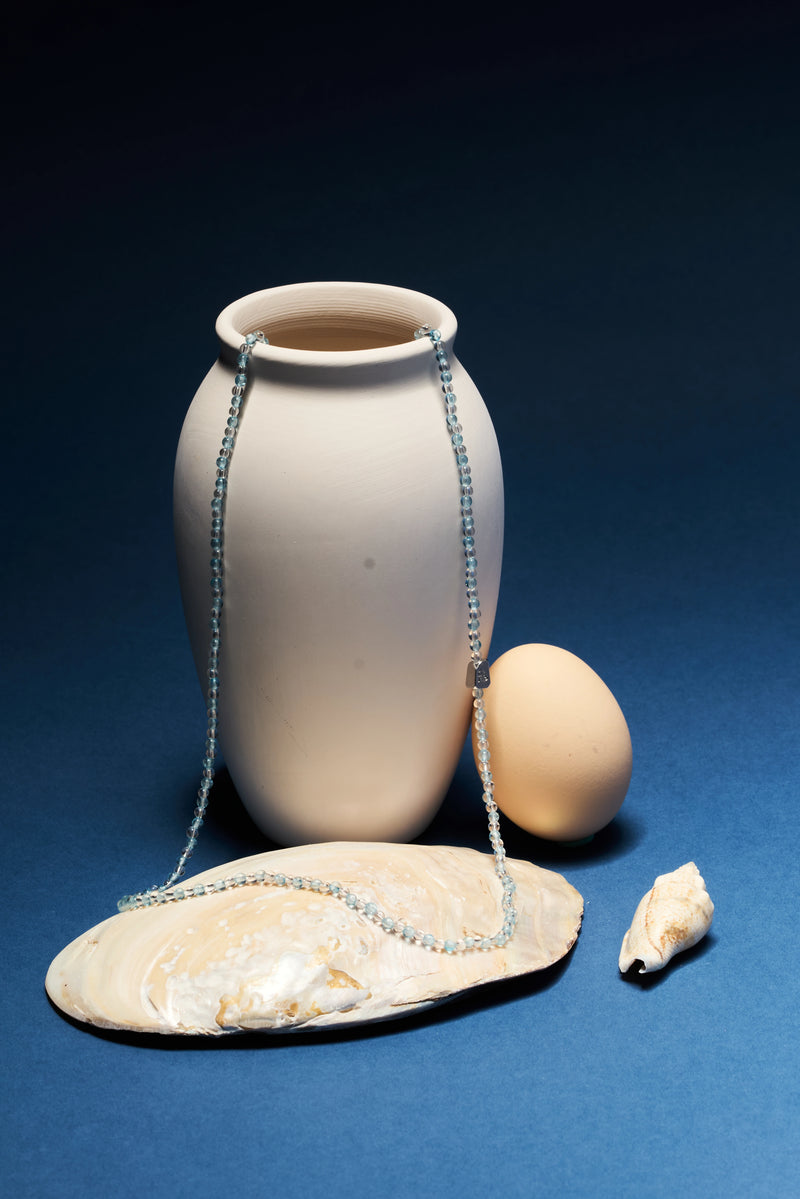 Aquamarine and clear quartz eyeglass chain with gold-tone accents, stylish and functional accessory by ROCKBUND.
