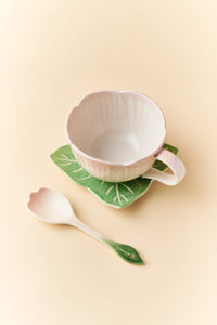 Ceramic pink begonia cup and saucer set with matching spoon, elegant tableware by TRLab Shop, showcasing floral design and glossy finish.