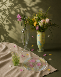 Luminous Fragment Glass Plate from TRLab Shop dinnerware, showcasing iridescent, fractured glass design for elegant table setting.