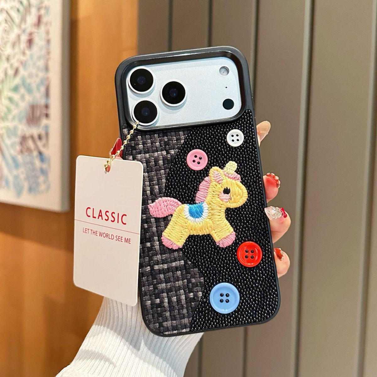 Beadworks embroidered unicorn phone case by TRLab Shop featuring colorful bead and embroidery details on a protective phone cover.