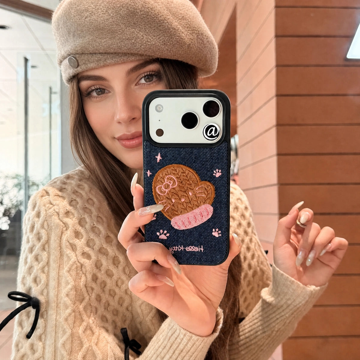 Embroidered warm cloak phone case by TRLab Shop, featuring intricate embroidery and soft fabric design for protection.