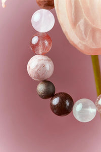 Strawberry Quartz and Red Jasper healing bracelet by ROCKBUND featuring vibrant red gemstones on a stretchy cord.