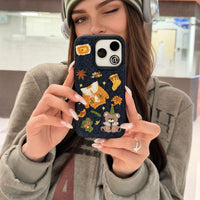 Warm autumn embroidered phone case by TRLab Shop with detailed floral embroidery on a soft fabric cover.