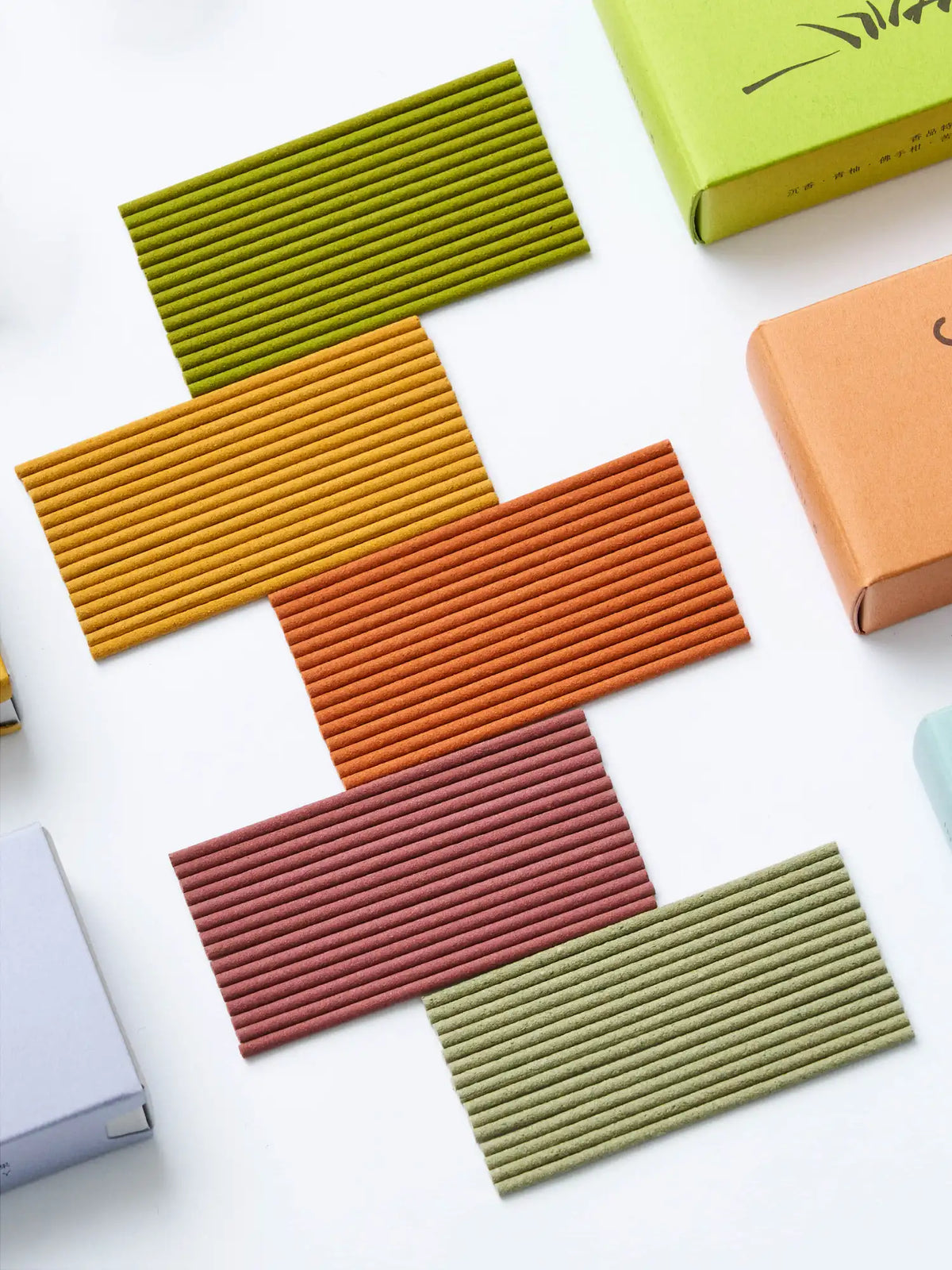 Colorful short incense mushroom gift box by YRGD with vibrant mushroom-shaped incense sticks inside.