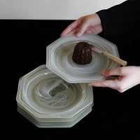 Green octagonal matte glass plate from TRLab Shop, showcasing a stylish geometric design with a smooth matte finish.