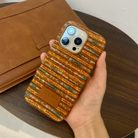 Striped corduroy phone case by TRLab Shop with colorful vertical stripes and soft textured fabric for iPhone or Android devices.