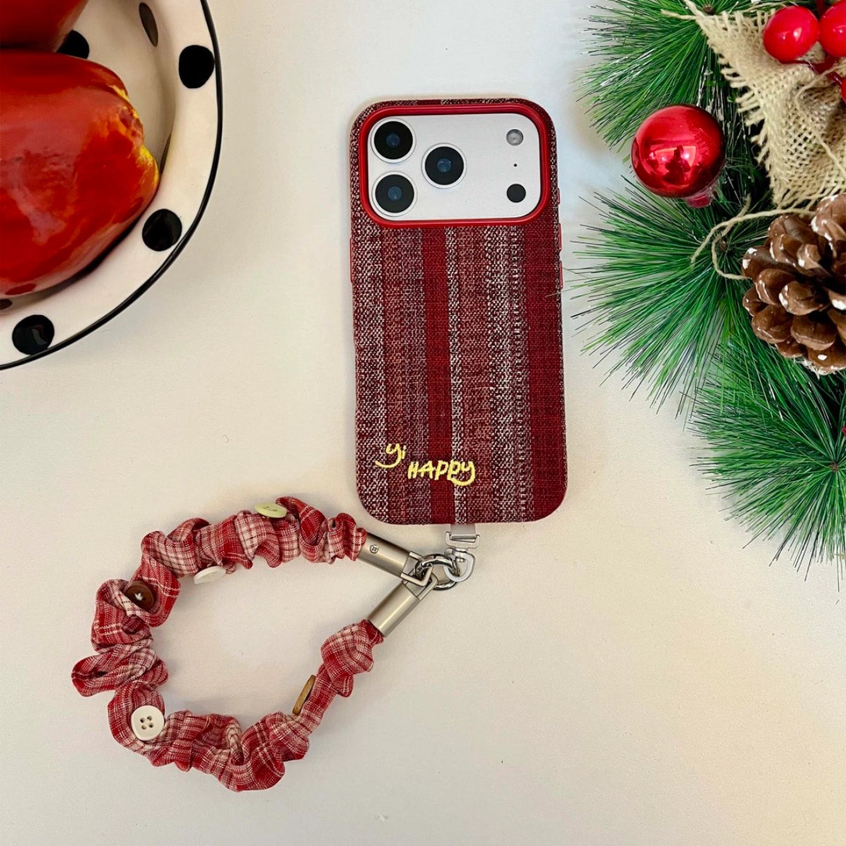 Embroidery phone case with colorful "Happy Letters" design from TRLab Shop, compatible with modern smartphones.
