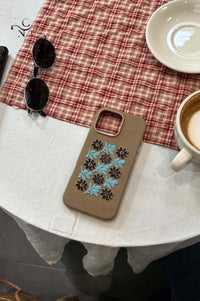 Vine and floral embroidered phone case by TRLab Shop, featuring colorful floral and vine designs on a protective smartphone cover.