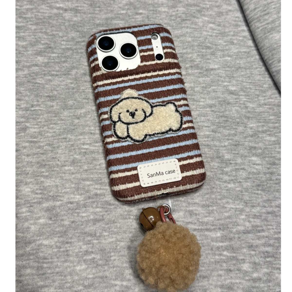 Terry Puppy embroidered phone case by TRLab Shop featuring a cute puppy design on a protective cover for smartphones.