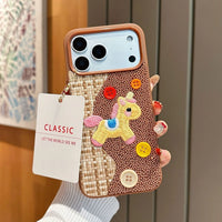 Tweed plaid embroidered unicorn phone case by TRLab Shop, featuring colorful unicorn design and textured fabric for iPhone protection.