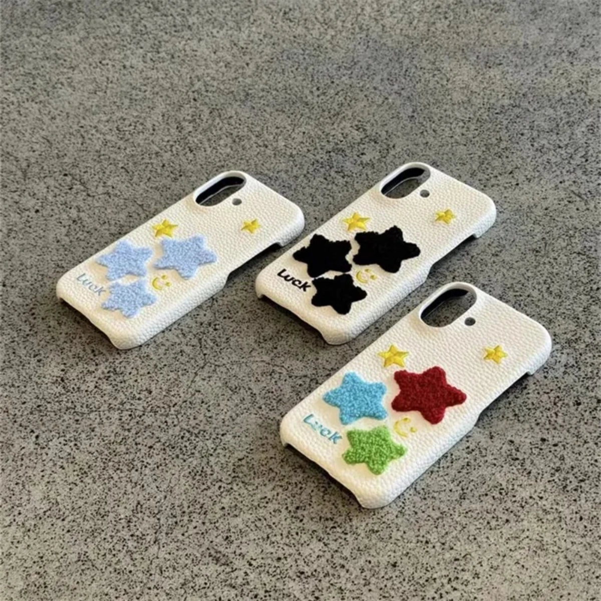 Leather Terry Star embroidered phone case by TRLab Shop featuring a textured leather design with star embroidery.