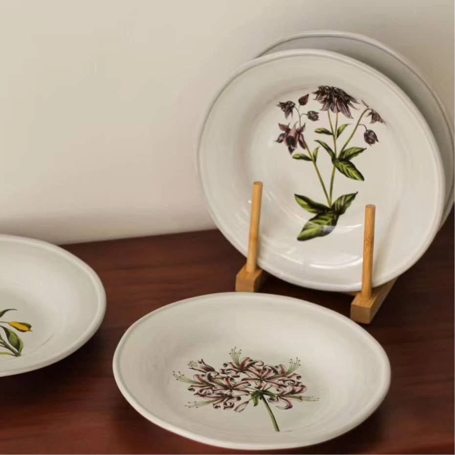 Decorative floral ceramic plate by TRLab Shop with colorful flower patterns, round shape, and glossy finish.