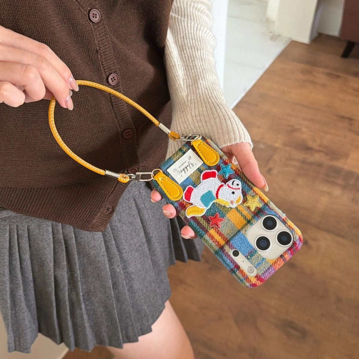 Plaid Pony embroidered phone case by TRLab Shop featuring a colorful plaid pattern and a cute pony embroidery design.