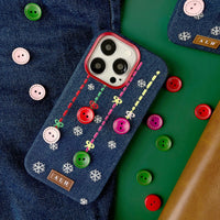 TRLab Shop embroidered phone case with buttons and snowflake design, featuring detailed stitching on a protective smartphone cover.
