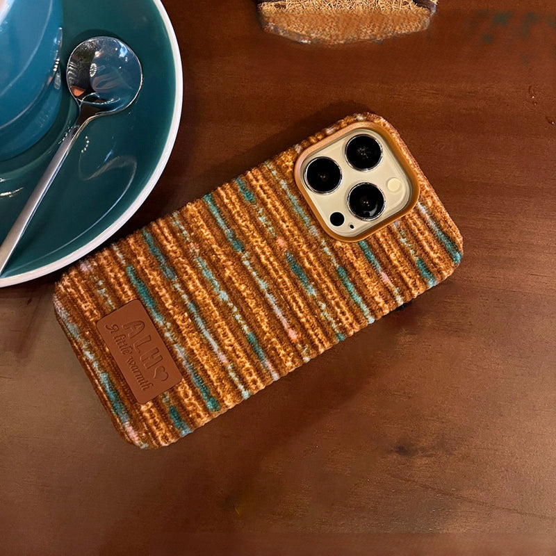 Striped corduroy phone case in beige and brown with a textured fabric surface, designed for iPhone models.