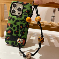 Green leopard print corduroy phone case with TRLab Shop branding, featuring a textured fabric pattern and snug fit for smartphones.