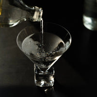 Clear glass wine cup with ice-cube base design, showcasing a modern and elegant style for serving wine.
