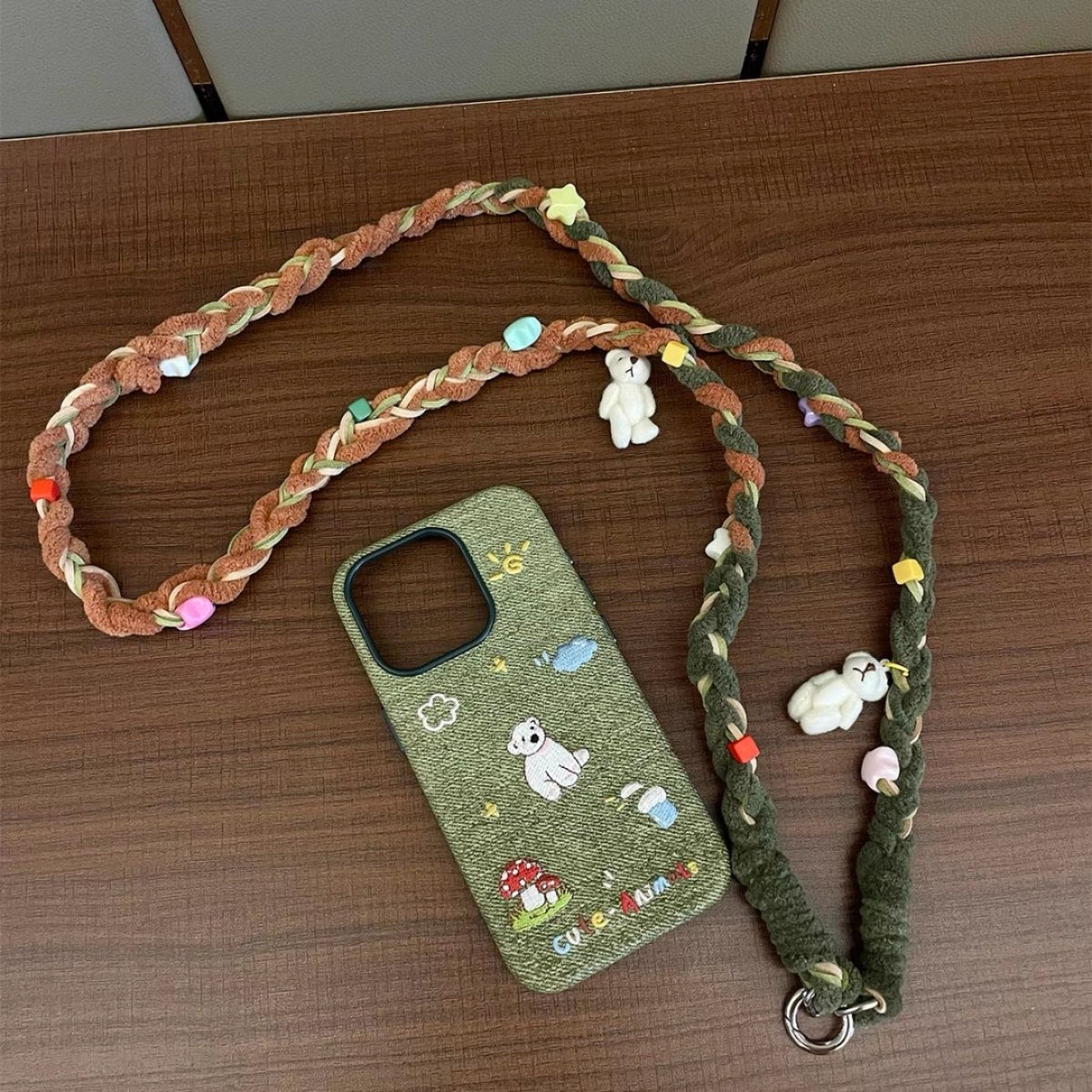 White bear embroidered phone case by TRLab Shop, featuring detailed bear embroidery on smooth white material.