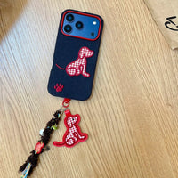 Plaid puppy embroidered phone case by TRLab Shop featuring a cute embroidered dog design on a plaid fabric background.