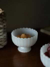 Milky-white glass bowl with smooth rounded edges, ideal for serving or display, branded by TRLab Shop.