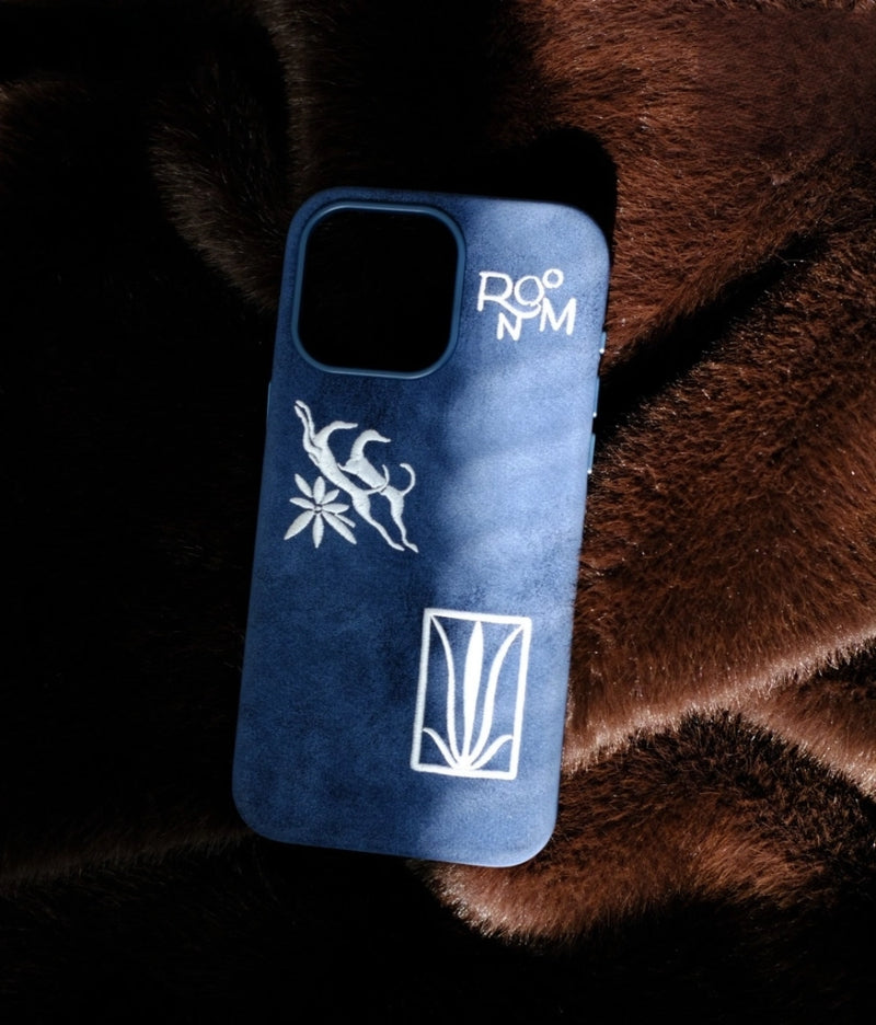 Blue shamanic embroidered phone case with intricate tribal designs for a protective, stylish accessory.