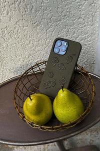 Green phone case with embroidered rose design by TRLab Shop, featuring detailed floral embroidery on a protective accessory.