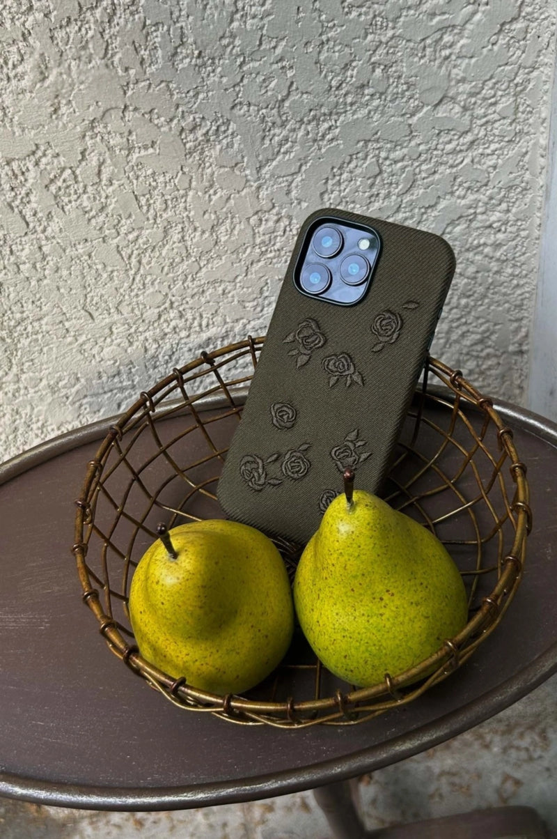 Green phone case with embroidered rose design by TRLab Shop, featuring detailed floral embroidery on a protective accessory.