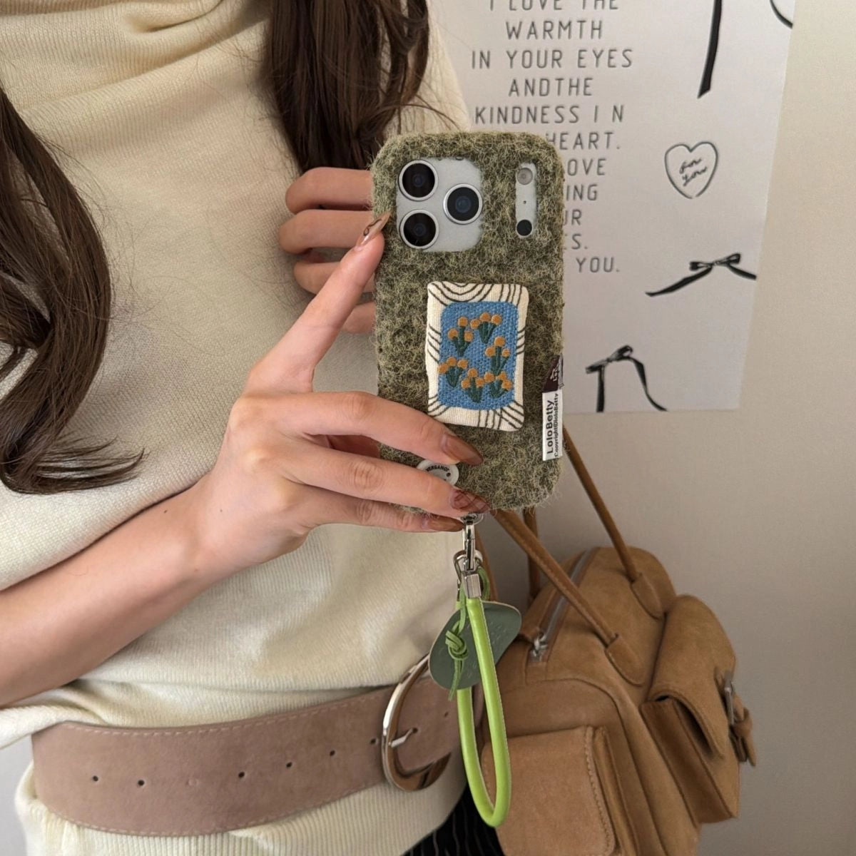 Embroidered tulip phone case by TRLab Shop showing colorful tulip embroidery on a protective phone cover.