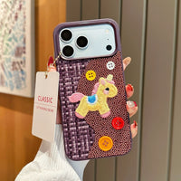 Tweed plaid embroidered unicorn phone case by TRLab Shop featuring colorful unicorn embroidery on a textured fabric background