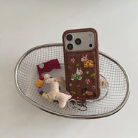 Embroidered pony design on TRLab Shop phone case, featuring colorful stitching and protective material for smartphone protection.