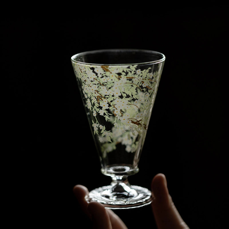 Pear-blossom design glass goblet by TRLab Shop featuring a clear, elegant stemmed glass with a pear blossom pattern.