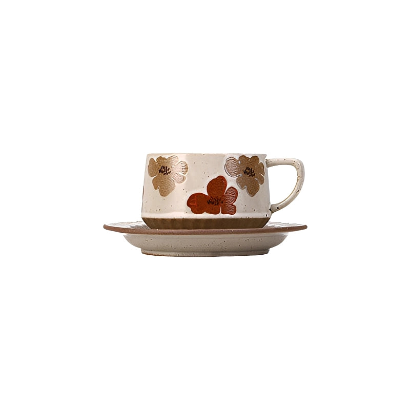 Retro floral ceramic coffee cup and saucer set with colorful floral pattern, perfect for vintage-inspired coffee service