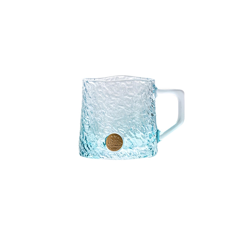 Glacier-textured gradient glass mug by TRLab Shop showing a clear glass mug with icy blue gradient and textured surface.
