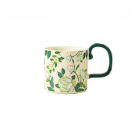 French-Style Camellia ceramic mug by TRLab Shop featuring a detailed floral design and a smooth ceramic finish.