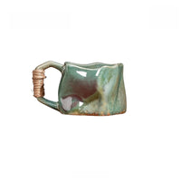 Ceramic mug with rope handle by TRLab Shop, featuring a smooth white surface and sturdy design for hot beverages.