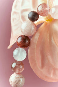 Strawberry Quartz and Red Jasper healing bracelet by ROCKBUND featuring polished beads on an elastic band.