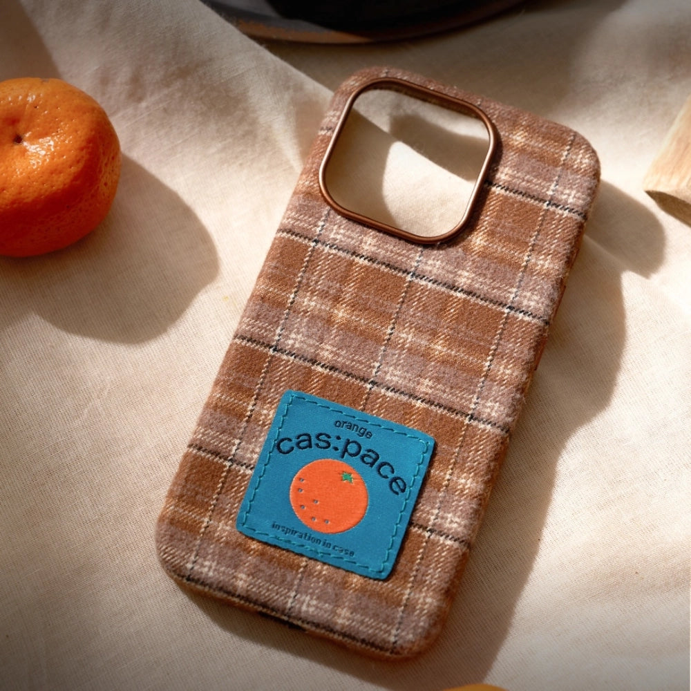Brown plaid fabric phone case by TRLab Shop, showing the textured fabric design and snug fit for a smartphone.