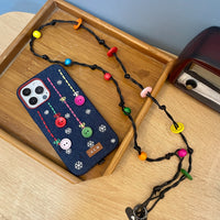TRLab Shop phone case with embroidered buttons and snowflake design, featuring colorful button details on a protective cover.