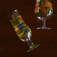 Hand-painted glass vase with intricate floral design, showcasing vibrant colors and artistic craftsmanship.