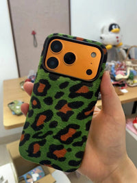 Green leopard print corduroy phone case by TRLab Shop featuring a textured fabric and slim design for iPhone or Android devices.