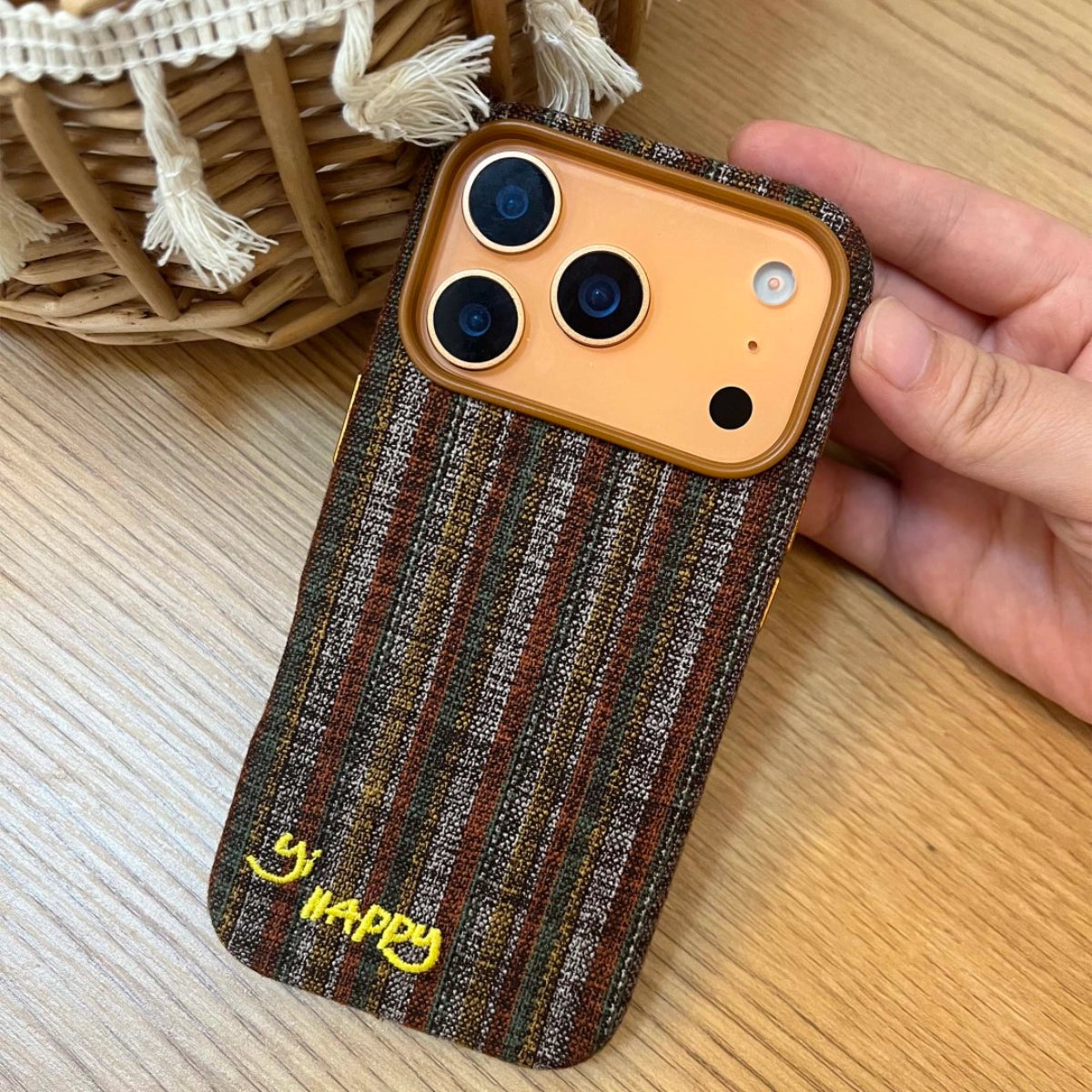 Embroidered Happy Letters phone case by TRLab Shop with colorful letter designs on a protective smartphone cover.