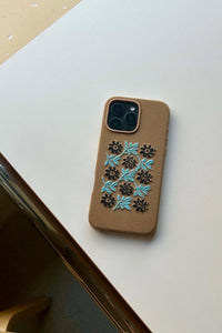 Vine and floral embroidered phone case by TRLab Shop featuring colorful floral and vine patterns on a protective cover.