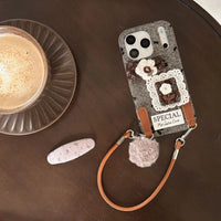 White flower embroidered phone case with intricate floral design, perfect for stylish protection of your smartphone.