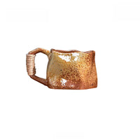 Ceramic mug with rope handle from TRLab Shop, showcasing a smooth, white design with a sturdy rope handle for a stylish look.