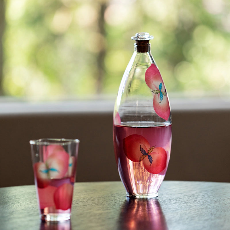 Spring Peach glass tumbler and cold brew bottle by TRLab Shop, featuring a clear glass design with peach accents for refreshing beverages.